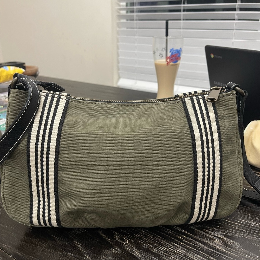 Authentic used Burberry blue label crossbody bag army green color.